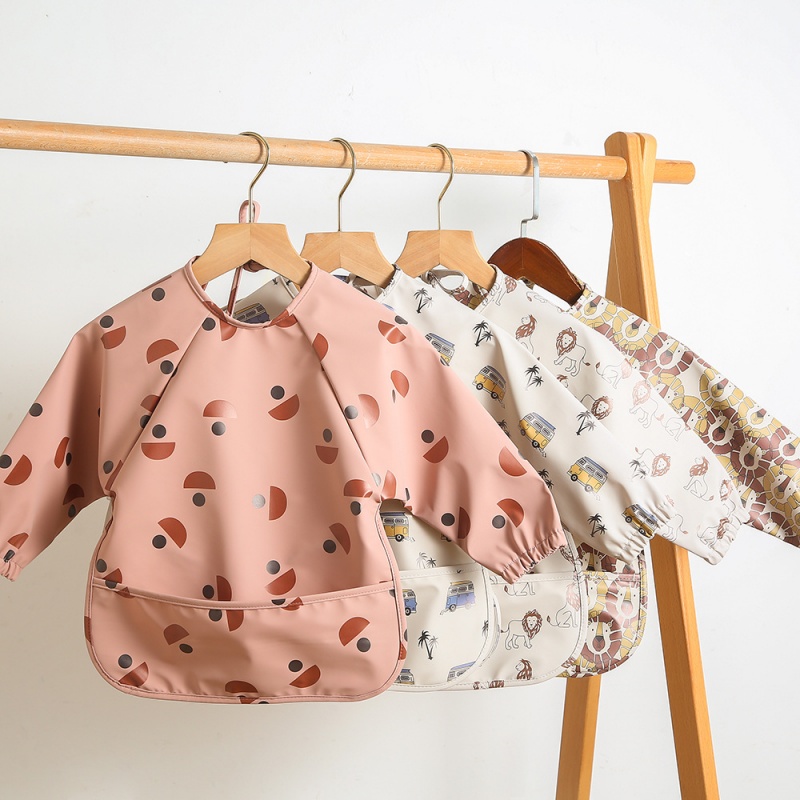 Long-sleeved PU reversible bib - огляд і ціна Bib Long Sleeve