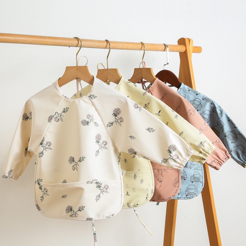 Long-sleeved PU reversible bib - огляд і ціна Bib Long Sleeve